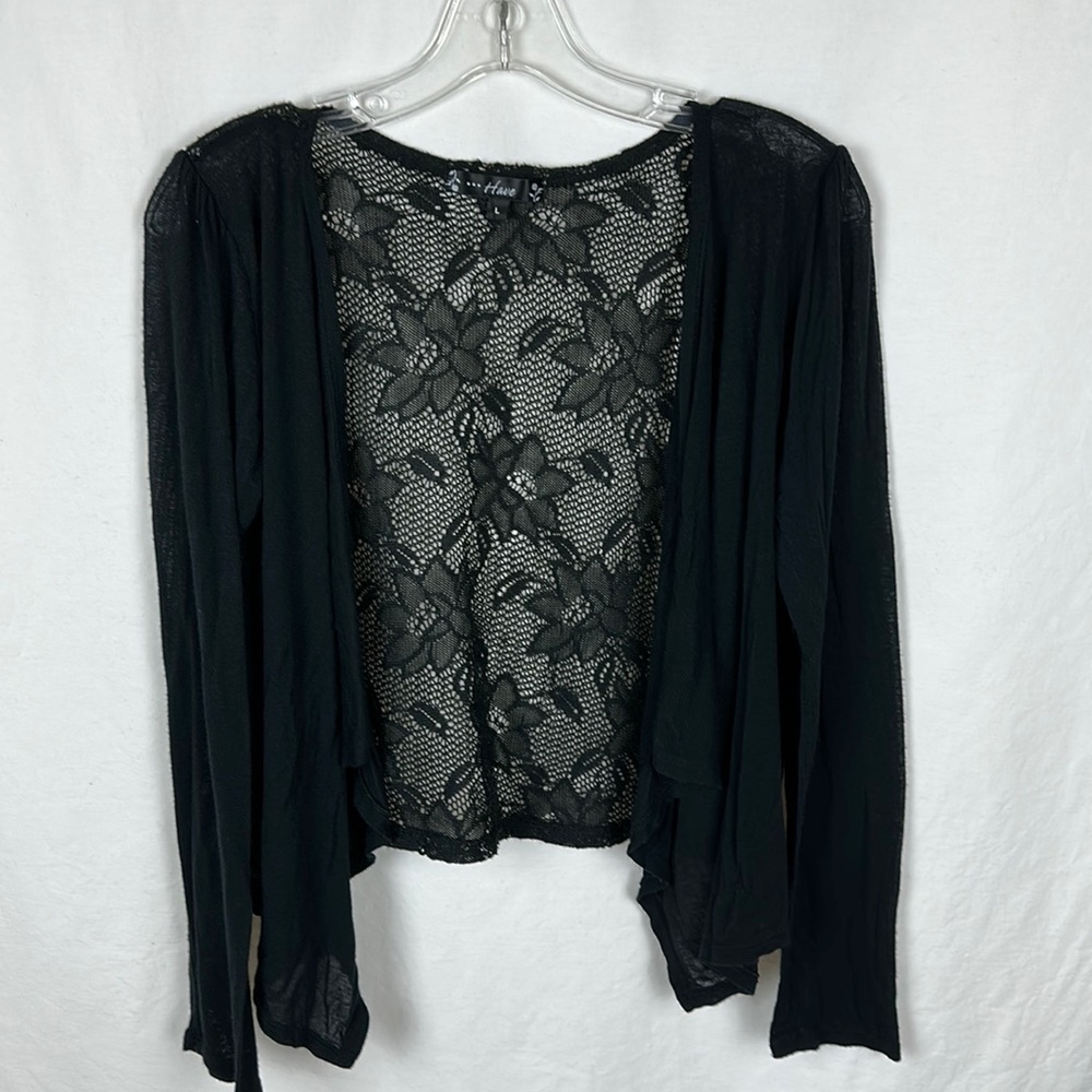 Have brand black open front top with pretty semi-sheer floral back, size L